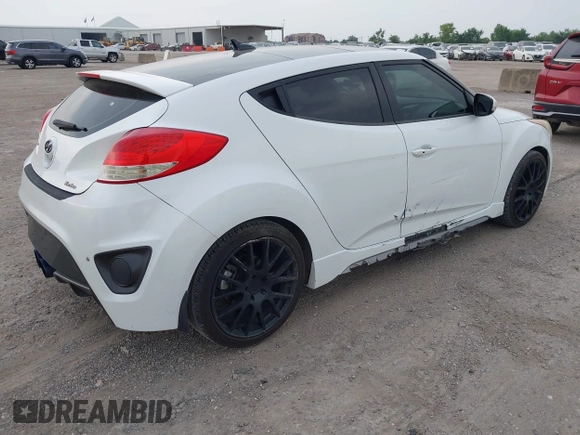 2013 Hyundai Veloster Turbo with VIN KMHTC6AE5DU104074, listed as a IAAI auction lot 42225574 with 172,836 mi miles and . Bid and sale history available at DreamBid. Image 4.