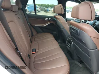2019 BMW X5 xDrive40i with VIN 5UXCR6C5XKLK80703, listed as a Copart auction lot 63473495 with 57,260 mi miles and Salvage title. Bid and sale history available at DreamBid. Image 11.