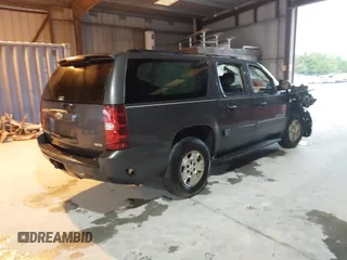 2010 Chevrolet Suburban LS with VIN 1GNUCHE01AR158111, listed as a IAAI auction lot 41602157 with 263,227 mi miles. Bid and sale history available at carsss.com. Image 4.