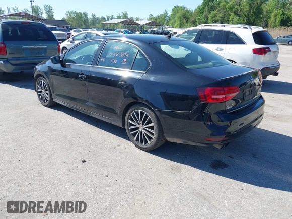 2015 Volkswagen Jetta SE z VIN 3VWD17AJ0FM348432, wystawiony jako IAAI lot #42124810 z przebiegiem 129 034 mil mil oraz . Historia ofert i sprzedaży dostępna na DreamBid. Obrazek 3.