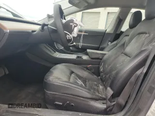 2022 Tesla Model 3 with VIN 5YJ3E1EA4NF371483, listed as a Copart auction lot 49287665 with 59,476 mi miles and Salvage Title. Bid and sale history available at DreamBid. Image 7.