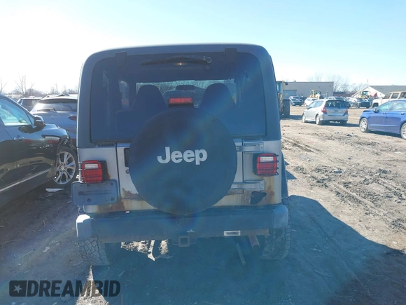 2002 Jeep Wrangler Sport with VIN 1J4FA49SX2P732367, listed as a IAAI auction lot 41805923 with 204,757 mi miles. Bid and sale history available at carsss.com. Image 16.