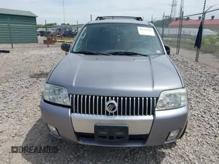 2007 Mercury Mariner Luxury z VIN 4M2CU91157KJ09026, wystawiony jako IAAI lot #42312495 z przebiegiem 156 572 mil mil oraz . Historia ofert i sprzedaży dostępna na DreamBid. Obrazek 12.