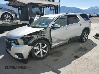 2021 Chevrolet Traverse LT z VIN 1GNEVHKW7MJ221657, wystawiony jako Copart lot #56243255 z przebiegiem 97 776 mil mil oraz Szkoda całkowita • Salvage title. Historia ofert i sprzedaży dostępna na DreamBid. Obrazek 1.
