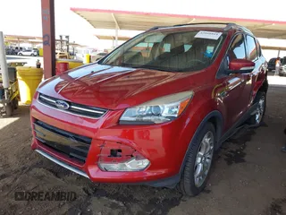 2013 Ford Escape Titanium with VIN 1FMCU0J96DUB08681, listed as a IAAI auction lot 42068864 with 102,094 mi miles and . Bid and sale history available at carsss.com. Image 17.
