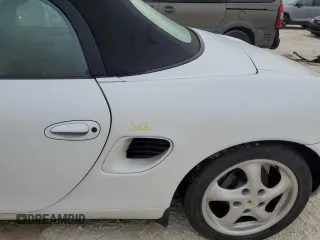 1998 Porsche Boxster с VIN WP0CA2987WU623387, выставлен на аукционе Copart как лот 76859594 с пробегом Не указан миль и Списание • Salvage title. История ставок и продаж доступна на DreamBid. Изображение 12.
