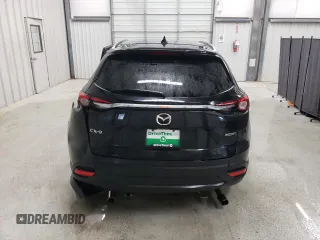2021 Mazda CX-9 Touring with VIN JM3TCACY4M0523188, listed as a Copart auction lot 48595205 with 99,999 mi miles and Clean title. Bid and sale history available at DreamBid. Image 6.