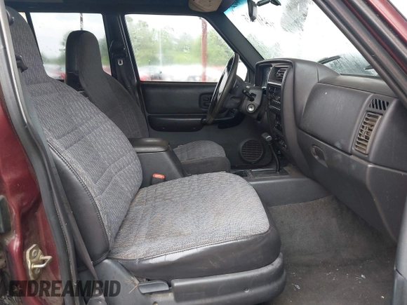 2000 Jeep Cherokee with VIN 1J4FT48S1YL249541, listed as a IAAI auction lot 42111925 with 361,482 mi miles and . Bid and sale history available at DreamBid. Image 5.