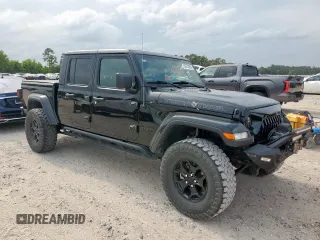 2023 Jeep Gladiator Freedom with VIN 1C6HJTAG7PL531273, listed as a Copart auction lot 56743255 with 41,226 mi miles and Salvage title. Bid and sale history available at DreamBid. Image 4.