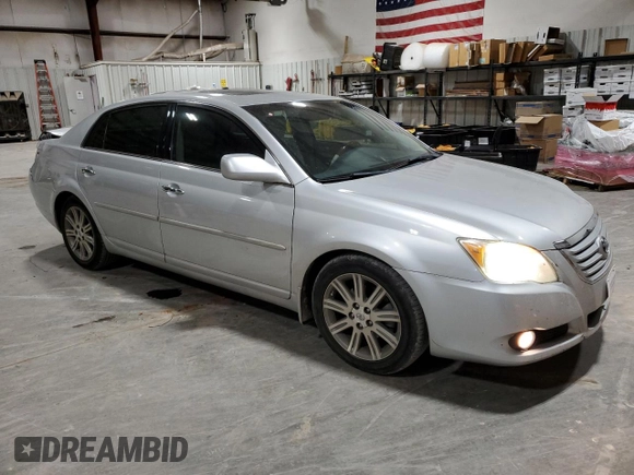 2009 Toyota Avalon XL with VIN 4T1BK36B69U348772, listed as a Copart auction lot 84166684 with 143,349 mi miles and Salvage Title. Bid and sale history available at carsss.com. Image 4.