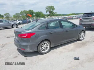 2016 Ford Focus SE z VIN 1FADP3F2XGL298174, wystawiony jako IAAI lot #42468032 z przebiegiem 236 803 mil mil oraz . Historia ofert i sprzedaży dostępna na DreamBid. Obrazek 4.