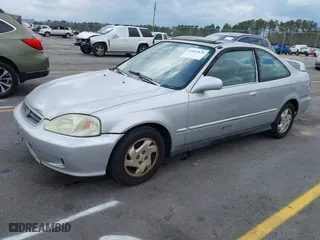 2000 Honda Civic EX with VIN 1HGEJ8246YL011923, listed as a IAAI auction lot 41857839 with 215,334 mi miles. Bid and sale history available at carsss.com. Image 2.