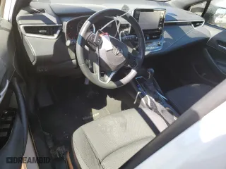 2021 Toyota Corolla Hatchback SE with VIN JTND4MBE4M3132376, listed as a Copart auction lot 47357005 with 104,713 mi miles and Salvage Title. Bid and sale history available at carsss.com. Image 8.