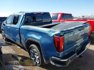 2024 GMC Sierra 1500 SLT with VIN 3GTPHDEDXRG299077, listed as a IAAI auction lot 41415109 with 16,141 mi miles and . Bid and sale history available at DreamBid. Image 3.