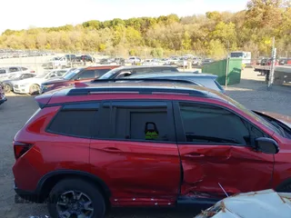 2022 Honda Passport TrailSport with VIN 5FNYF8H61NB015883, listed as a IAAI auction lot 40662061 with 19,212 mi miles and . Bid and sale history available at carsss.com. Image 12.