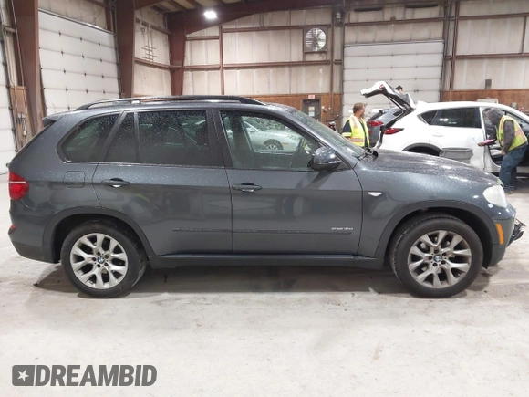 2012 BMW X5 35i z VIN 5UXZV4C59CL985715, wystawiony jako IAAI lot #42307586 z przebiegiem 105 147 mil mil oraz . Historia ofert i sprzedaży dostępna na DreamBid. Obrazek 13.