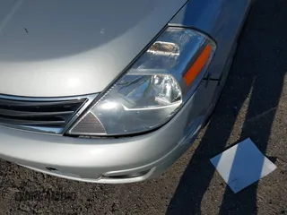 2012 Nissan Versa S with VIN 3N1BC1CP7CK253573, listed as a IAAI auction lot 42035812 with 97,026 mi miles. Bid and sale history available at carsss.com. Image 6.