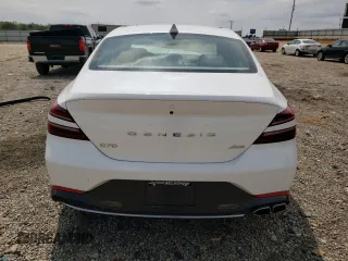 2023 Genesis G70 2.0T z VIN KMTG34TA6PU131925, wystawiony jako Copart lot #52611895 z przebiegiem 30 474 mil mil oraz Szkody całkowita. Historia ofert i sprzedaży dostępna na DreamBid. Obrazek 6.