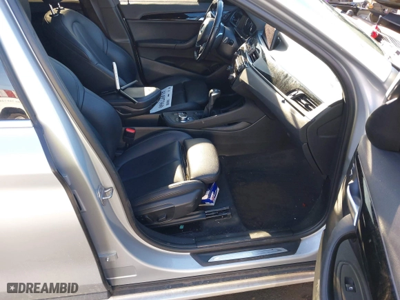 2018 BMW X1 xDrive28i with VIN WBXHT3C36J5L33781, listed as a IAAI auction lot 41497360 with 61,251 mi miles. Bid and sale history available at carsss.com. Image 5.