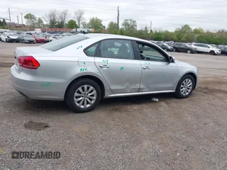 2015 Volkswagen Passat 1.8T Limited Edition with VIN 1VWAT7A32FC003645, listed as a IAAI auction lot 42091376 with 140,675 mi miles. Bid and sale history available at carsss.com. Image 4.