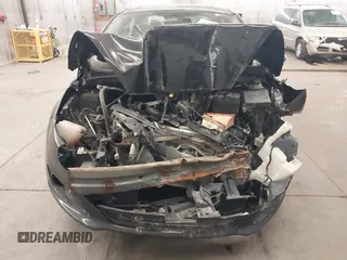 2014 Ford Fiesta SE with VIN 3FADP4BJ9EM212156, listed as a IAAI auction lot 41791690 with 92,760 mi miles and . Bid and sale history available at DreamBid. Image 6.