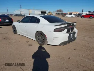 2021 Dodge Charger R/T with VIN 2C3CDXCT4MH588104, listed as a IAAI auction lot 41455312 with 72,162 mi miles and . Bid and sale history available at DreamBid. Image 3.