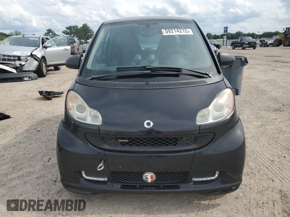 2009 Smart fortwo Pure z VIN WMEEJ31XX9K269982, wystawiony jako Copart lot #59214215 z przebiegiem 99 711 mil mil oraz Tytuł czysty. Historia ofert i sprzedaży dostępna na DreamBid. Obrazek 5.