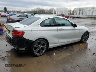 2015 BMW 2 Series 228i xDrive with VIN WBA1F7C55FVX95879, listed as a Copart auction lot 50167085 with 84,804 mi miles and Salvage Title. Bid and sale history available at carsss.com. Image 3.