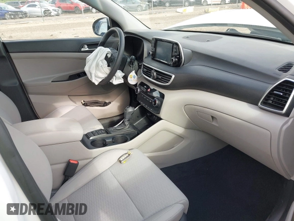 2019 Hyundai Tucson Value z VIN KM8J33A41KU013023, wystawiony jako IAAI lot #42302643 z przebiegiem 41 231 mil mil oraz . Historia ofert i sprzedaży dostępna na DreamBid. Obrazek 5.