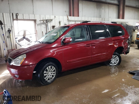2012 Kia Sedona LX with VIN KNDMG4C71C6432577, listed as a Copart auction lot 49298405 with 205,983 mi miles and Salvage Title. Bid and sale history available at carsss.com. Image 1.