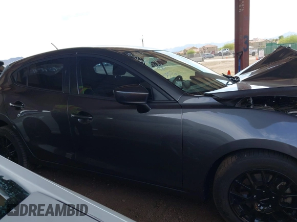 2018 Mazda 3 Sport with VIN 3MZBN1K73JM273472, listed as a IAAI auction lot 41901038 with 99,527 mi miles and . Bid and sale history available at DreamBid. Image 12.