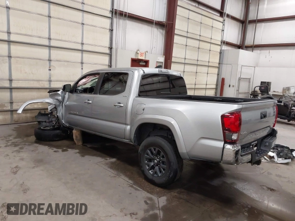 2023 Toyota Tacoma SR with VIN 3TMCZ5AN9PM604793, listed as a IAAI auction lot 42251347 with 39,741 mi miles and . Bid and sale history available at DreamBid. Image 3.