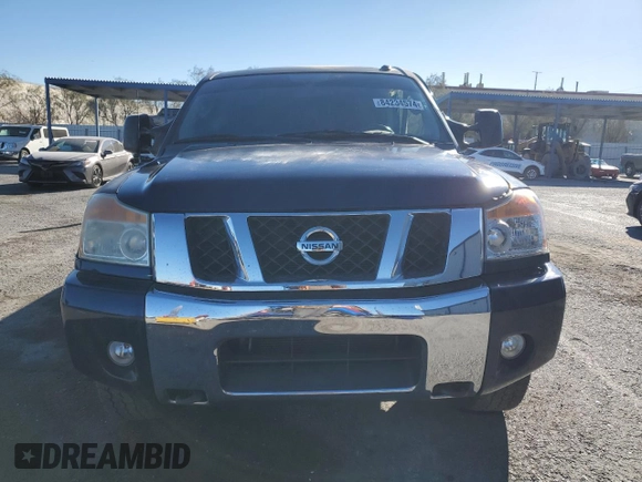 2010 Nissan Titan LE with VIN 1N6AA0EC5AN314233, listed as a Copart auction lot 84234574 with 175,110 mi miles and Salvage Title. Bid and sale history available at carsss.com. Image 5.