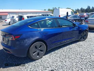 2023 Tesla Model 3 z VIN 5YJ3E1EA9PF639141, wystawiony jako IAAI lot #42167773 z przebiegiem 57 459 mil mil oraz . Historia ofert i sprzedaży dostępna na DreamBid. Obrazek 4.