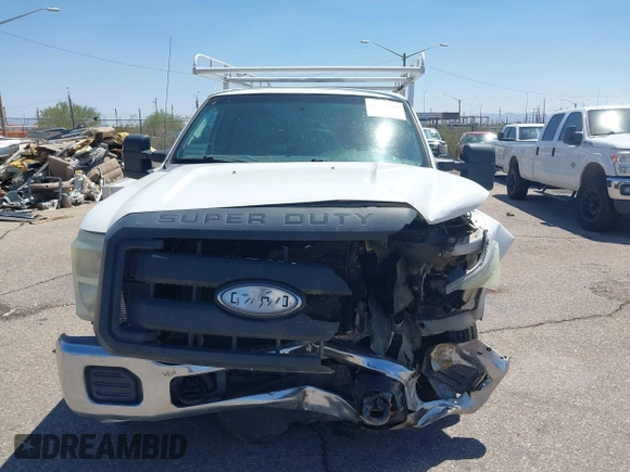 2012 Ford F-250 XL z VIN 1FDBF2A60CEC68510, wystawiony jako IAAI lot #42396003 z przebiegiem 185 303 mil mil oraz . Historia ofert i sprzedaży dostępna na DreamBid. Obrazek 13.