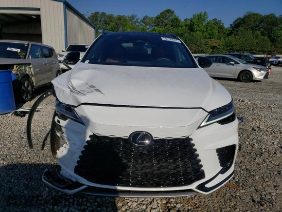 2023 Lexus RX with VIN 2T2BCMEAXPC006344, listed as a Copart auction lot 58256654 with 9,590 mi miles and Salvage Title. Bid and sale history available at carsss.com. Image 5.