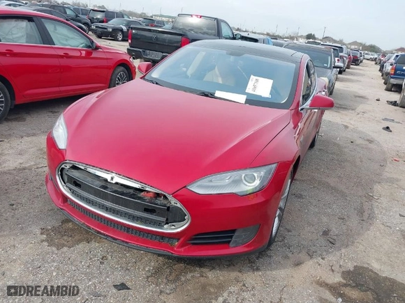 2013 Tesla Model S with VIN 5YJSA1CN9DFP09973, listed as a IAAI auction lot 41657188 with 61,546 mi miles. Bid and sale history available at carsss.com. Image 2.