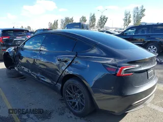 2024 Tesla Model 3 with VIN 5YJ3E1EA0RF718703, listed as a IAAI auction lot 41278243 with 6,504 mi miles. Bid and sale history available at carsss.com. Image 3.
