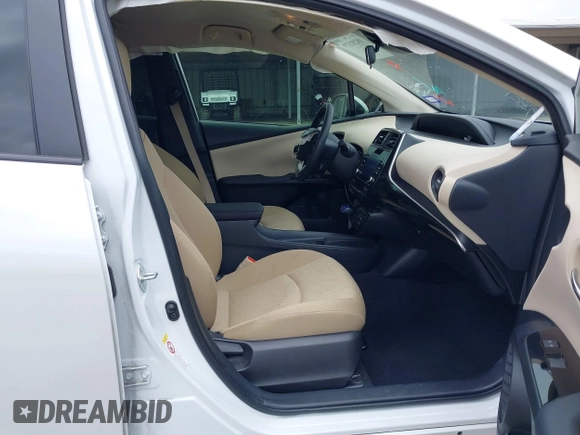 2022 Toyota Prius L Eco with VIN JTDKAMFUXN3157225, listed as a IAAI auction lot 39292379 with 59,333 mi miles and . Bid and sale history available at DreamBid. Image 5.