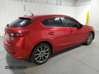 2018 Mazda 3 Touring with VIN 3MZBN1L34JM177605, listed as a Copart auction lot 52559395 with 56,267 mi miles and Clean Title. Bid and sale history available at DreamBid. Image 3.