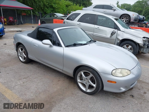 2002 Mazda MX-5 Miata Cloth with VIN JM1NB353820229890, listed as a IAAI auction lot 42750045 with 116,227 mi miles and . Bid and sale history available at DreamBid. Image 1.