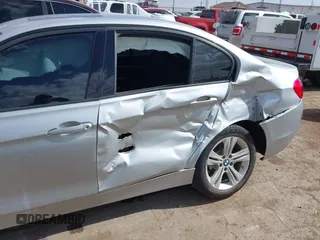 2016 BMW 3 Series with VIN WBA8F1C53GK439039, listed as a IAAI auction lot 40713471 with 117,595 mi miles and . Bid and sale history available at DreamBid. Image 6.