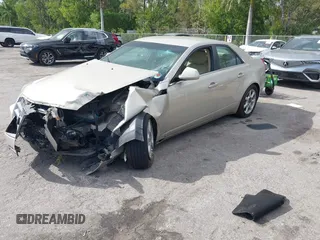 2008 Cadillac CTS AWD z VIN 1G6DG577280155483, wystawiony jako IAAI lot #41723609 z przebiegiem 132 756 mil mil oraz . Historia ofert i sprzedaży dostępna na DreamBid. Obrazek 2.