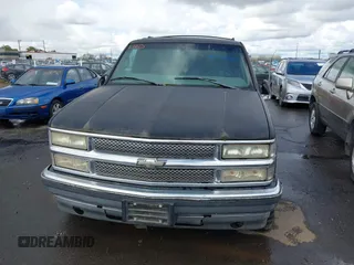 1999 Chevrolet Tahoe Z71 with VIN 1GNEK13R1XJ425996, listed as a IAAI auction lot 41798943 with 203,106 mi miles and . Bid and sale history available at DreamBid. Image 6.