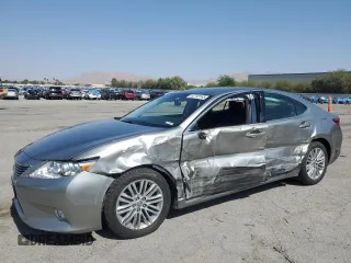 2015 Lexus ES 330 with VIN JTHBK1GGXF2211004, listed as a Copart auction lot 62740165 with 83,262 mi miles and Salvage title. Bid and sale history available at DreamBid. Image 1.