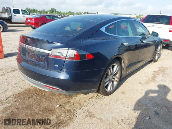 2014 Tesla Model S 60 with VIN 5YJSA1H12EFP39873, listed as a IAAI auction lot 42443414 with 132,773 mi miles and . Bid and sale history available at DreamBid. Image 4.
