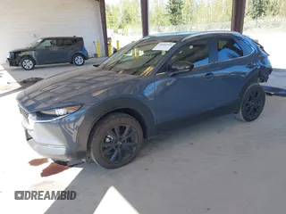 2024 Mazda CX-30 S Preferred with VIN 3MVDMBCM0RM641917, listed as a IAAI auction lot 42058344 with 3,005 mi miles and . Bid and sale history available at DreamBid. Image 2.