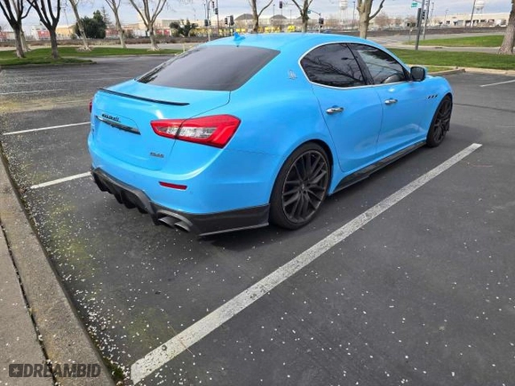 2014 Maserati Ghibli S Q4 with VIN ZAM57RTA7E1089301, listed as a Copart auction lot 54070585 with 59,787 mi miles and Salvage Title. Bid and sale history available at carsss.com. Image 4.
