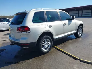 2008 Volkswagen Touareg V6 with VIN WVGBE77L88D003117, listed as a IAAI auction lot 42049007 with 156,940 mi miles and . Bid and sale history available at DreamBid. Image 4.
