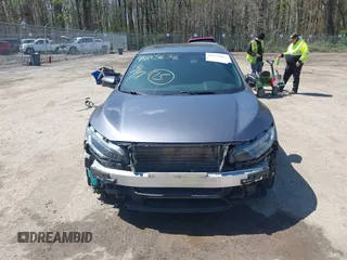 2020 Honda Civic Si z VIN 2HGFC1E53LH704576, wystawiony jako IAAI lot #41979301 z przebiegiem 59 245 mil mil oraz . Historia ofert i sprzedaży dostępna na DreamBid. Obrazek 13.
